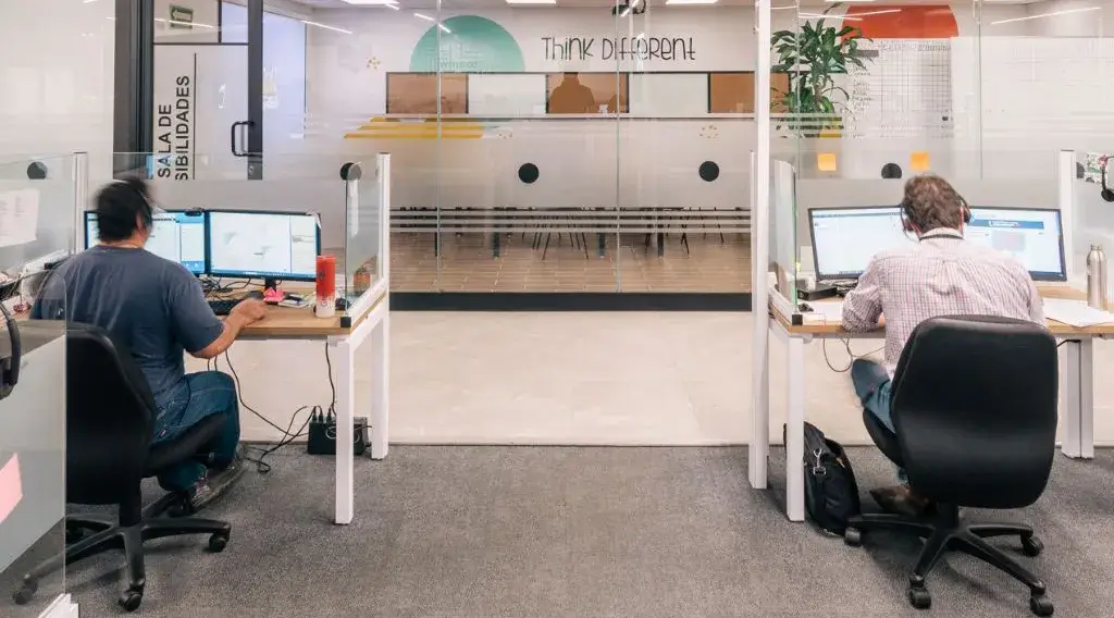 Bilingual agents working at a Mexico call center outsourcing facility