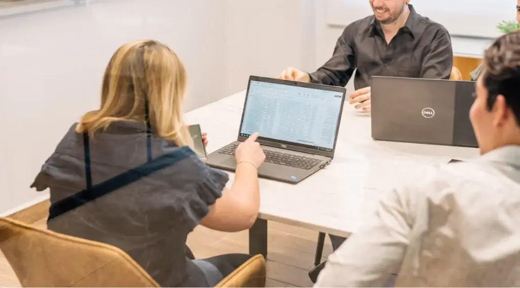 Finance team preparing reports for U.S. clients via outsourced accounting services – Intugo