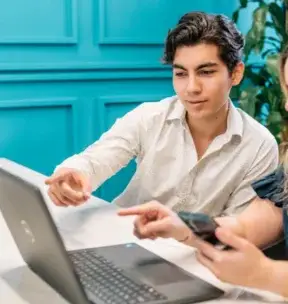 Nearshore Male administrator consulting reports to a co-worker