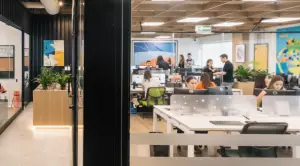Nearshore BPO team in Mexico collaborating in modern office.