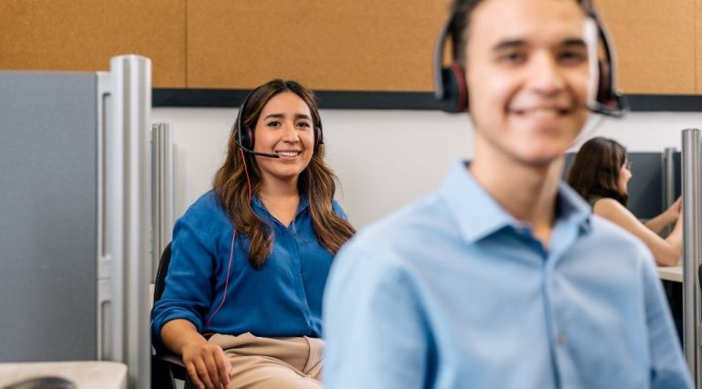 Nearshore call center team collaborating on customer experience optimization