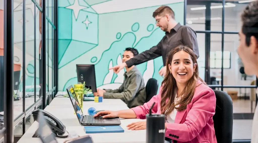Intugo BPO Center Solution team working in a collaborative office environment in Mexico